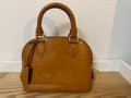 Sac Louis Vuitton Alma BB en cuir verni Monogram