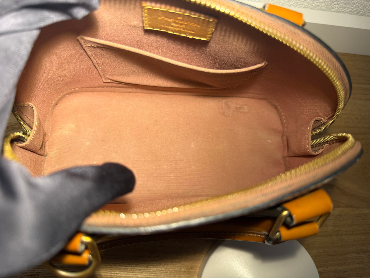 Sac Louis Vuitton Alma BB en cuir verni Monogram